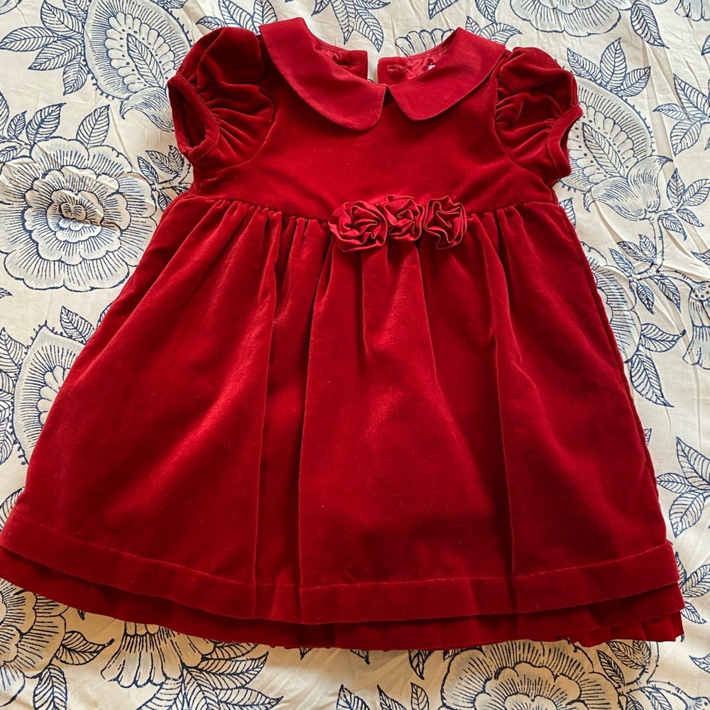 The sweetest little deep red velvet holiday dress; worn once.